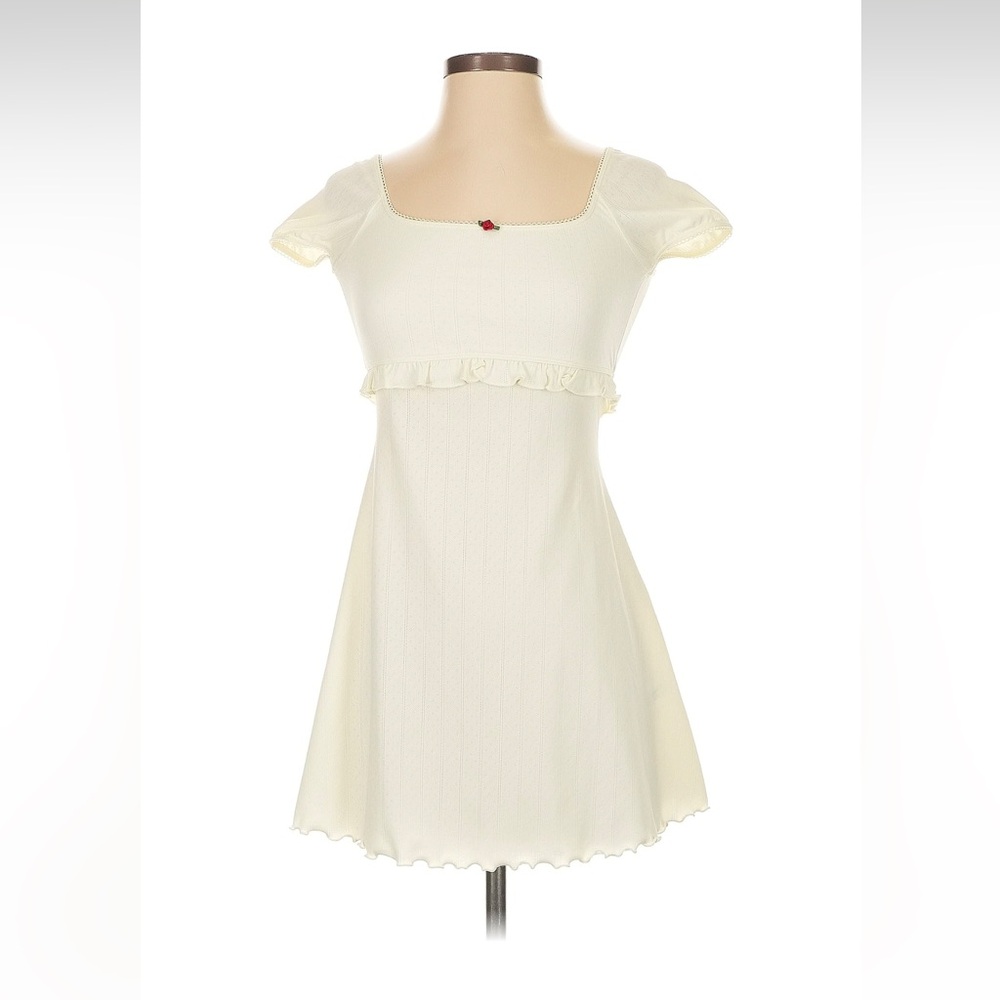 Frankie’s Bikinis Elegant Cream Dress with Ruffles and Rosette